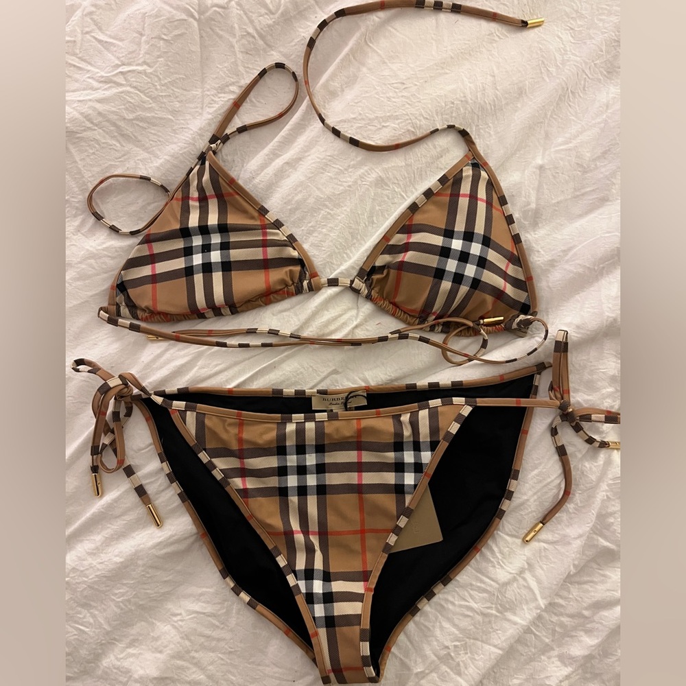 Never worn Burberry two piece bathing suit.